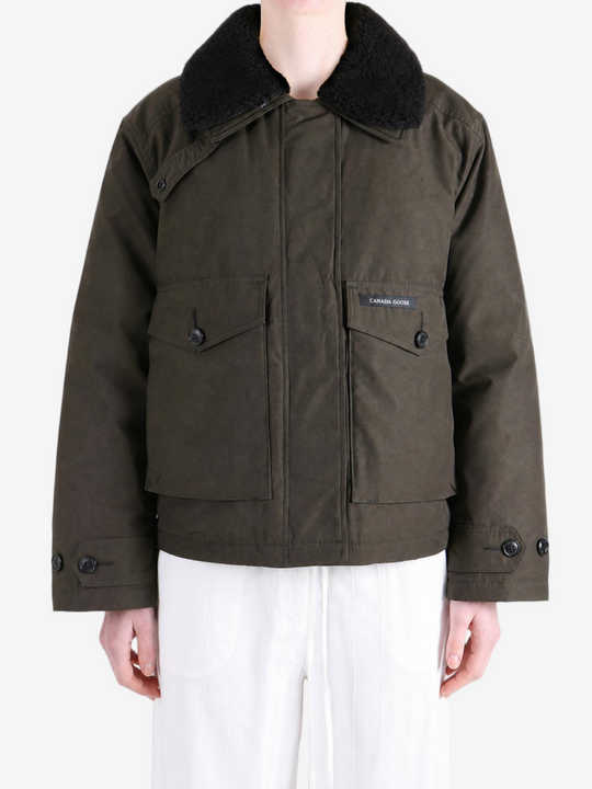 Brown jacket worn by a person, showing the jacket fit