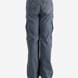 Grey jeans worn by a person, showing the jeans' fit