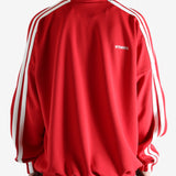 Red jacket worn by a person, showing the jacket's fit