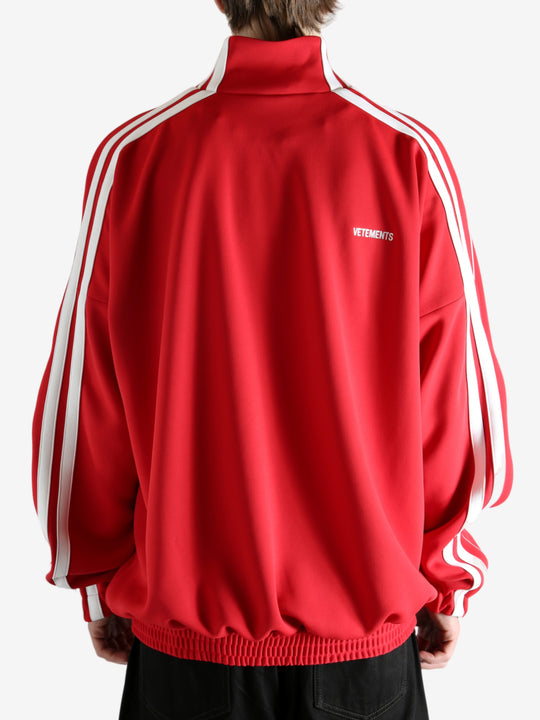 Red jacket worn by a person, showing the jacket's fit