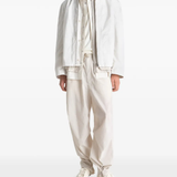 Tan jacket, full body view