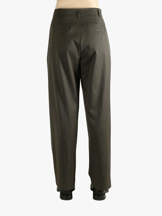 Brown pants worn by a person, showing the pants's fit