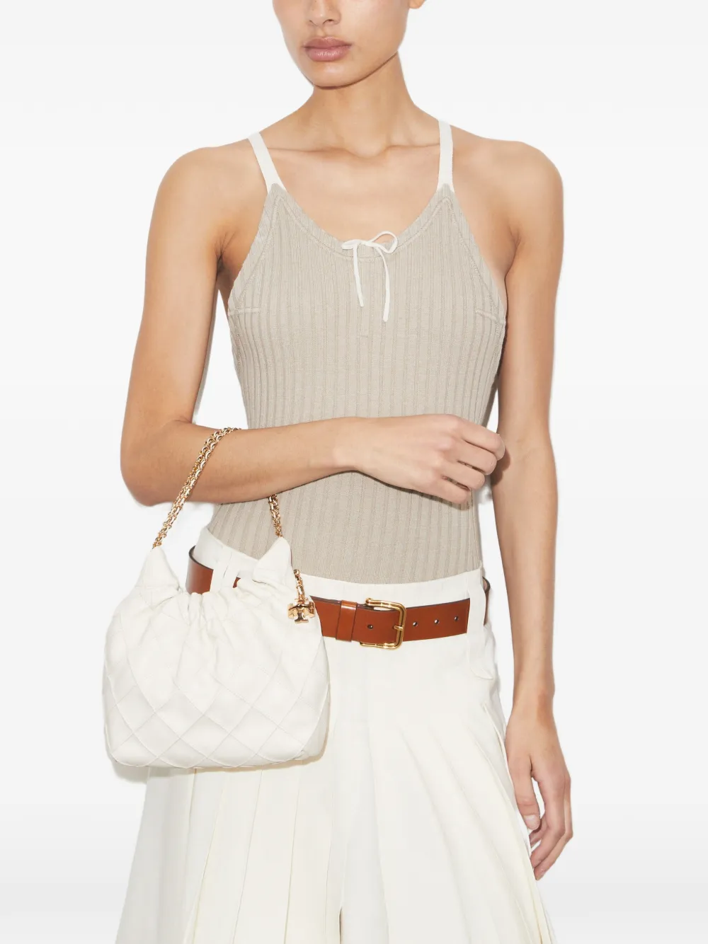 White bag worn by a person, showing the bag fit