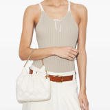 White bag worn by a person, showing the bag fit