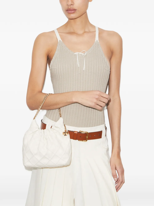 White bag worn by a person, showing the bag fit