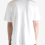 White t-shirt worn by a person, showing the shirt's fit
