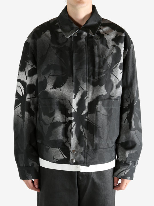 Black jacket worn by a person, showing the jacket's fit