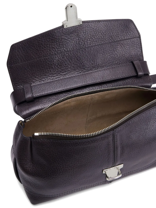 Close up of the black bag, showing texture of the leather fabric