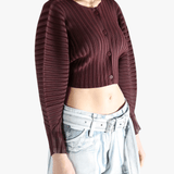 Brown cardigan worn by a person, showing the cardigan's fit