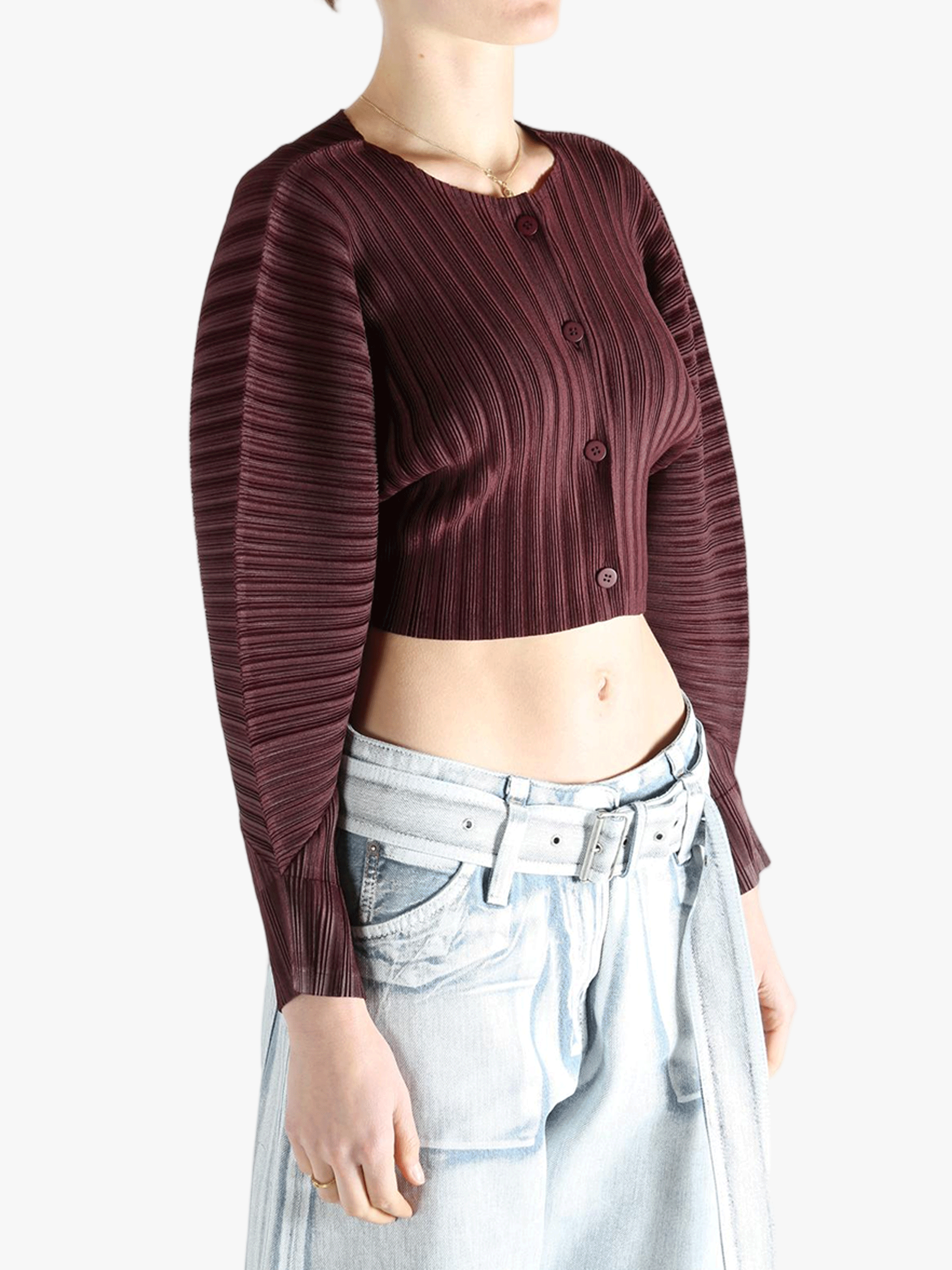 Brown cardigan worn by a person, showing the cardigan's fit