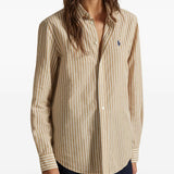 Tan shirt worn by a person, showing the shirt's fit

