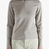 Grey knitwear worn by a person, showing the knitwear fit