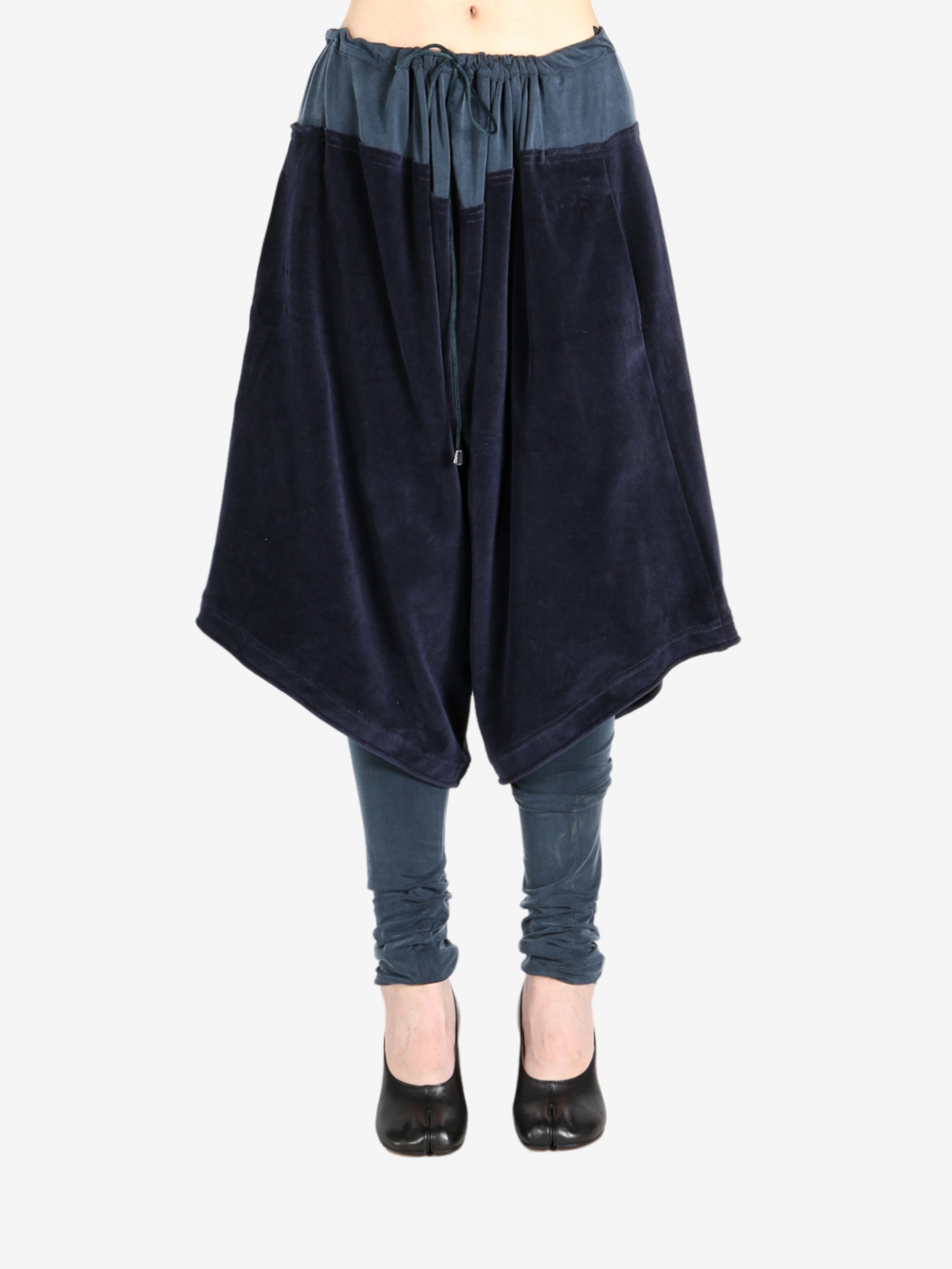 Navy trouser worn by a person, showing the trouser fit