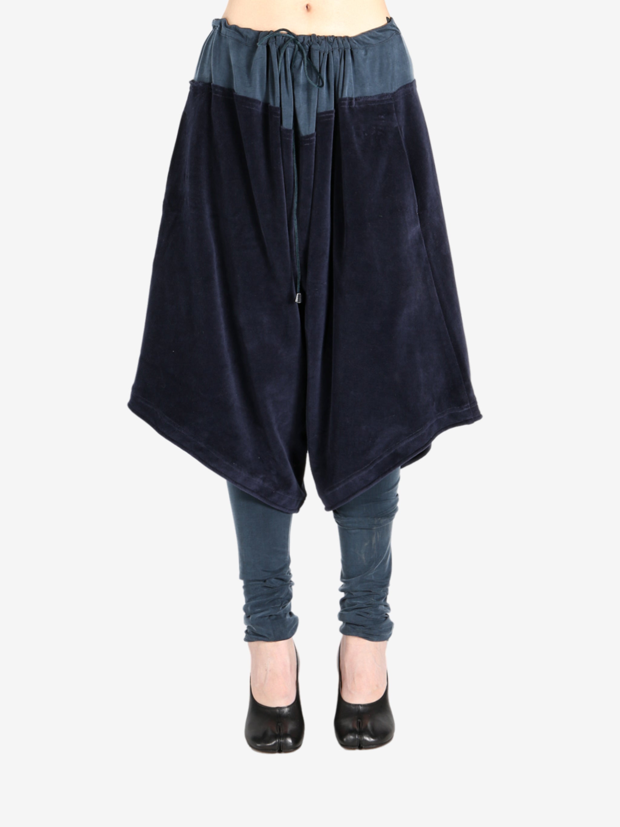 Navy trouser worn by a person, showing the trouser fit