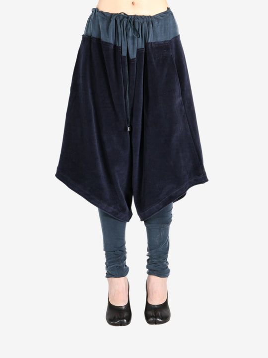 Navy trouser worn by a person, showing the trouser fit