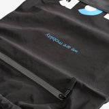 Close up of the black bag, showing texture of the nylon fabric