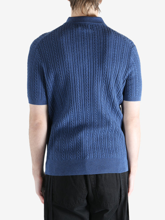 Navy t-shirt worn by a person, showing the shirt's fit