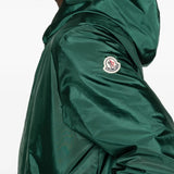 Close up of green jackets, showing texture of the polyamide fabric