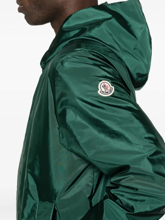 Close up of green jackets, showing texture of the polyamide fabric
