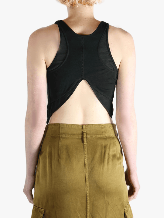 Black top worn by a person, showing the top's fit