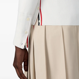 Close up of white cardigan,showing texture of the cotton fabric
