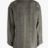 Blue jacket worn by a person, showing the jacket's fit