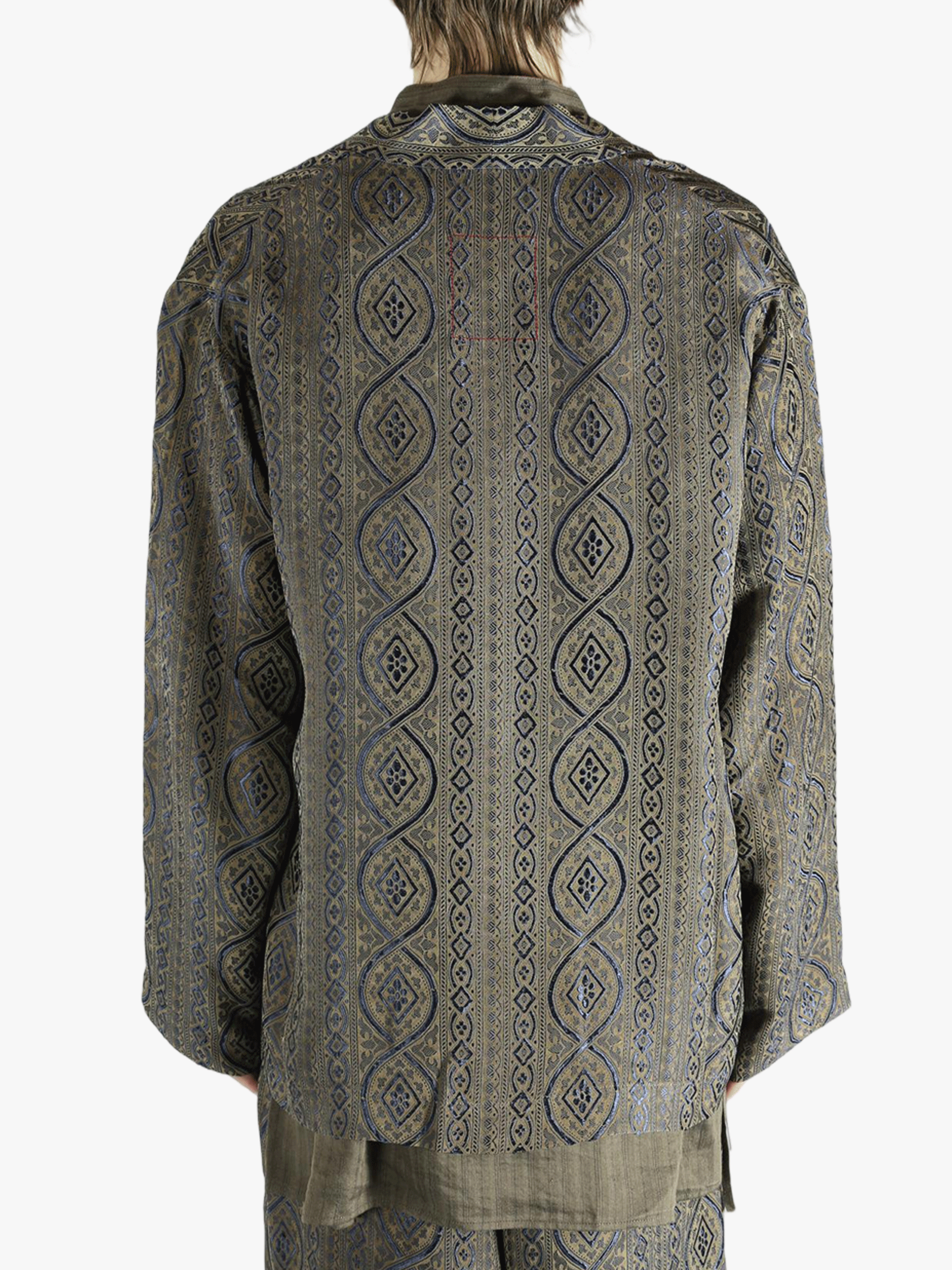 Blue jacket worn by a person, showing the jacket's fit