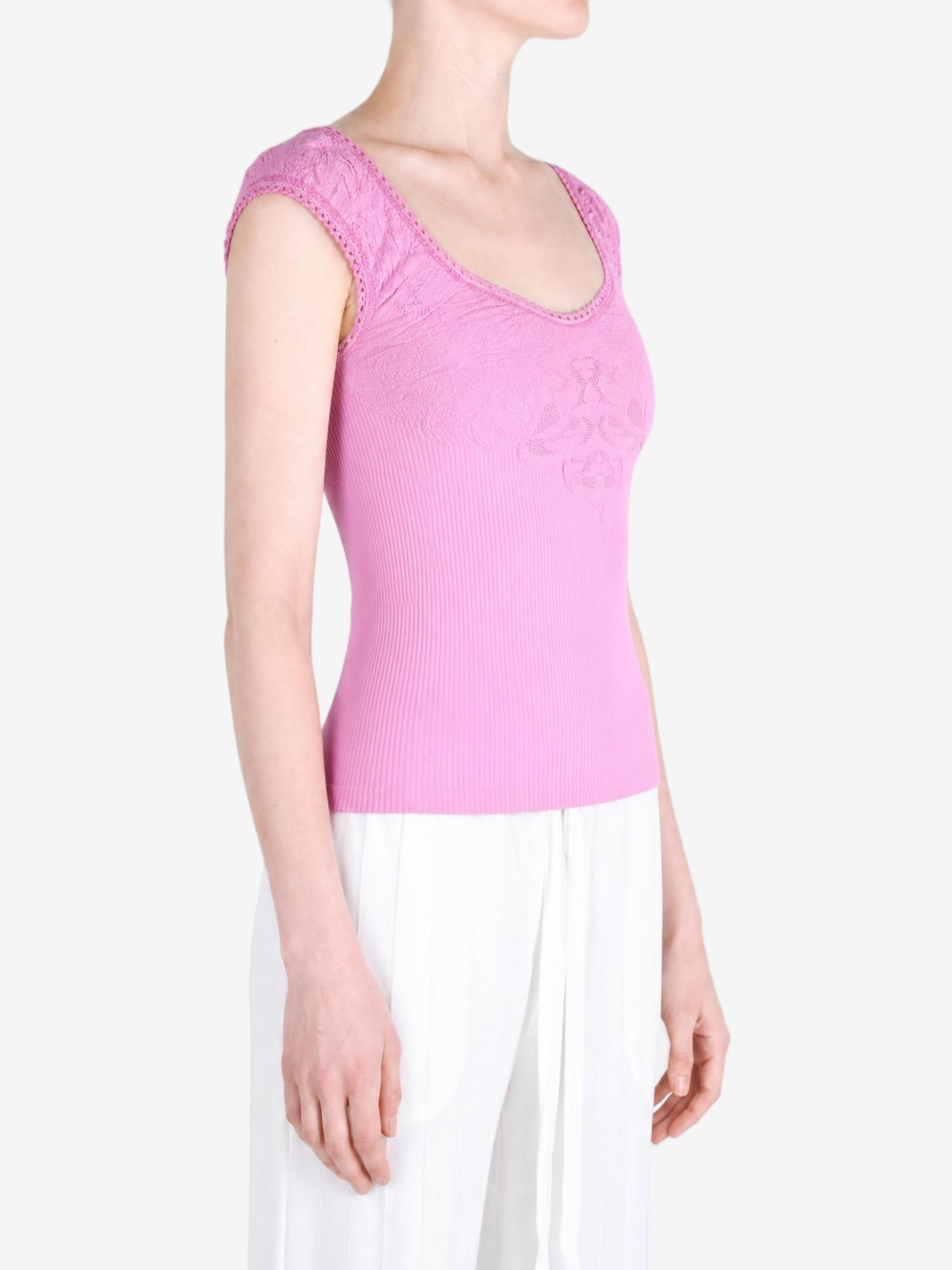Pink top worn by a person, showing the top fit