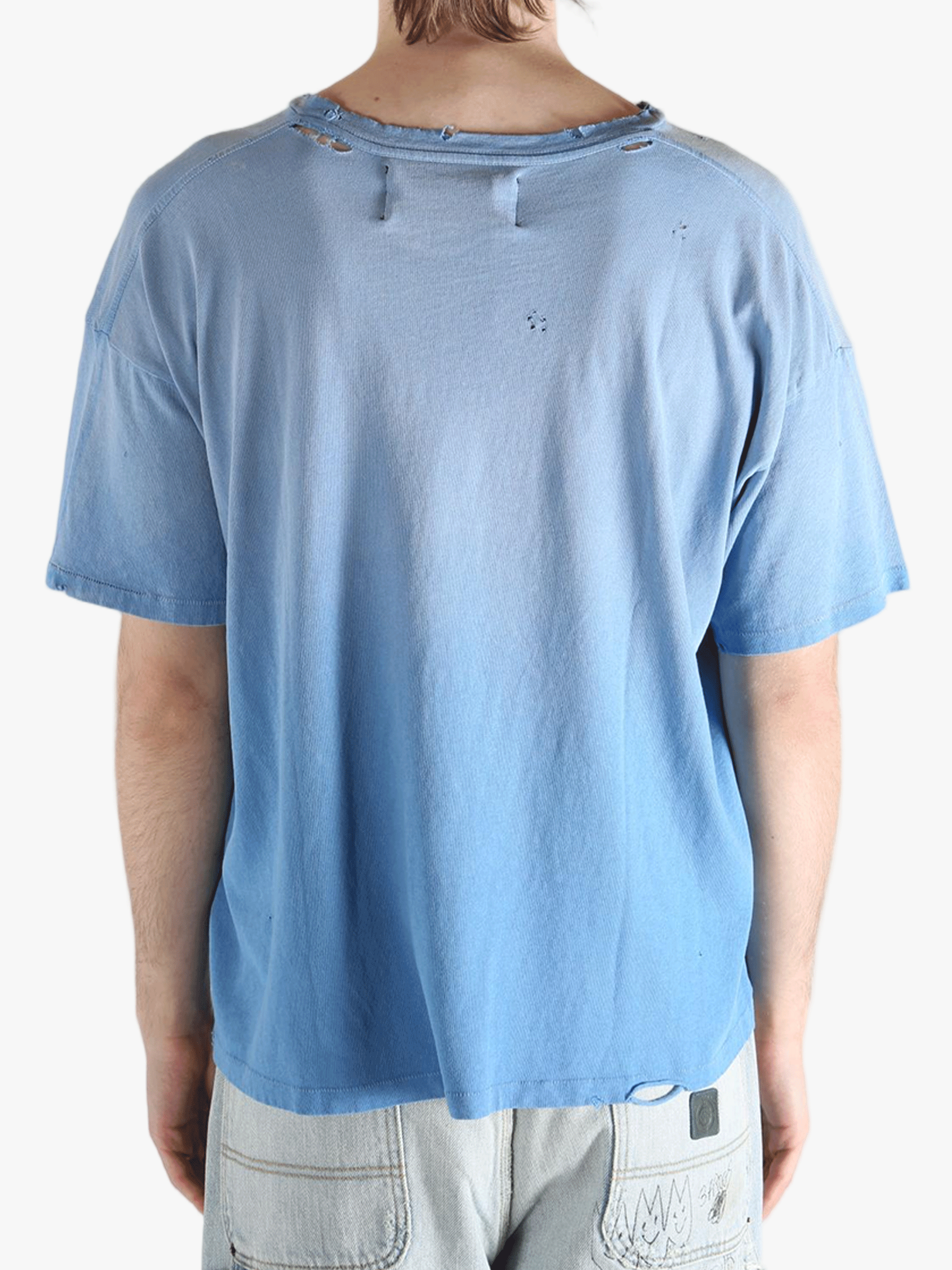 Blue t-shirt worn by a person, showing the shirt's fit