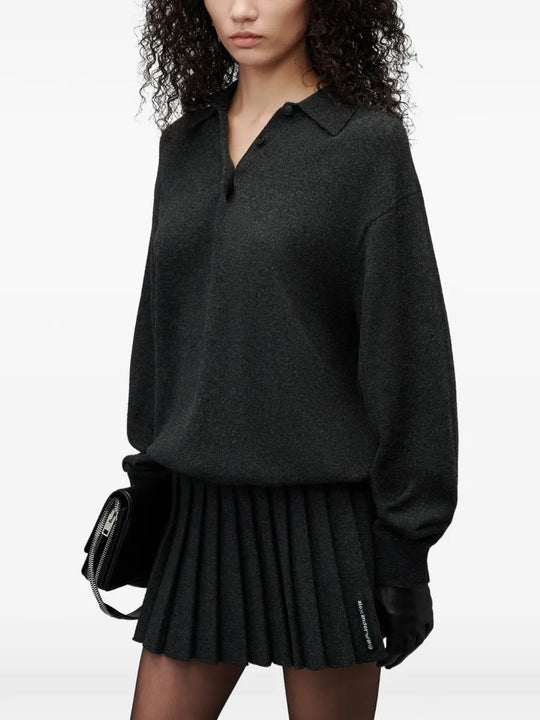 Black dress worn by a person, showing the dress fit