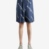 Navy short worn by a person, showing the short fit