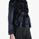 Navy jacket worn by a person, showing the jacket's fit