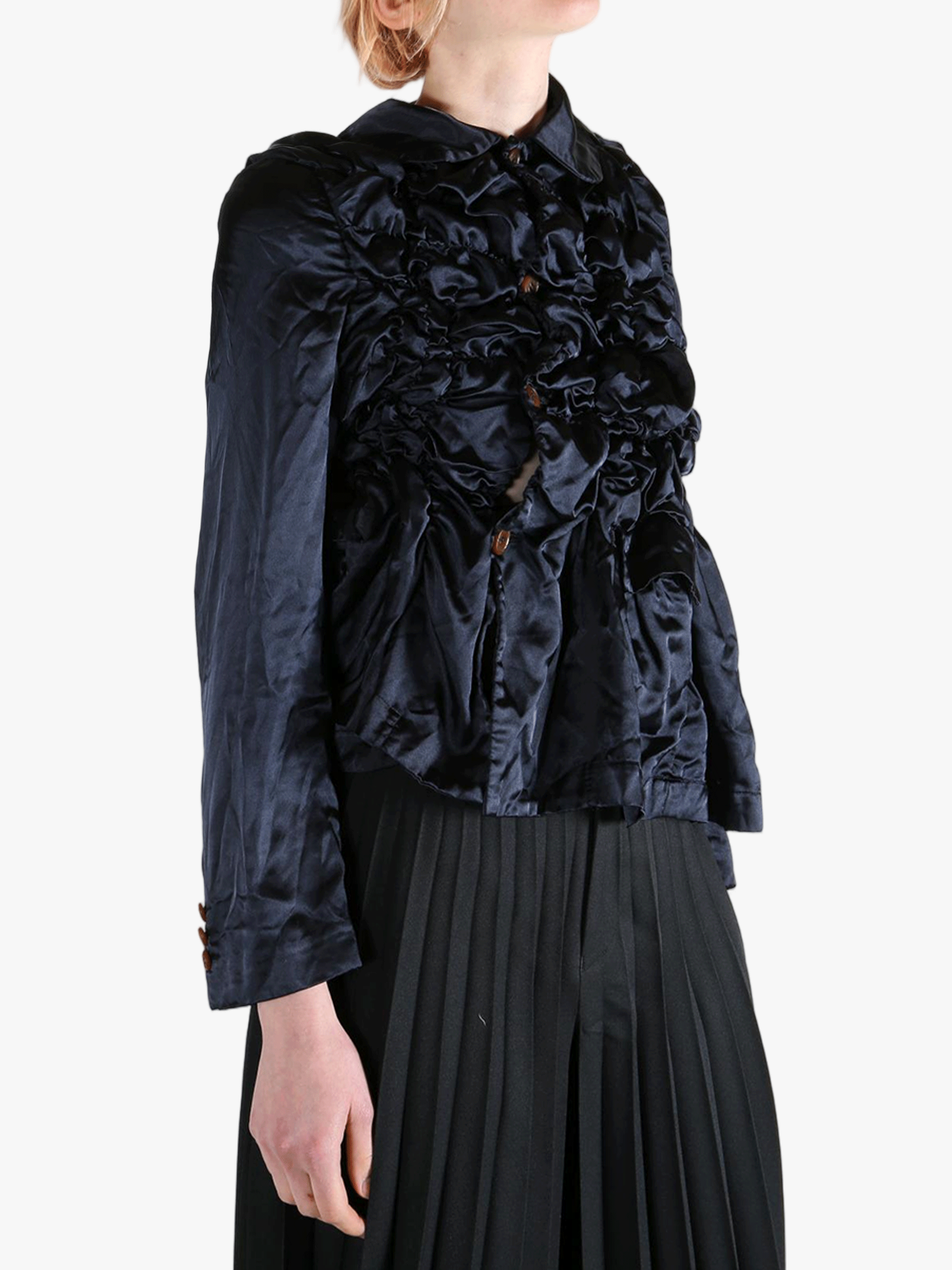 Navy jacket worn by a person, showing the jacket's fit