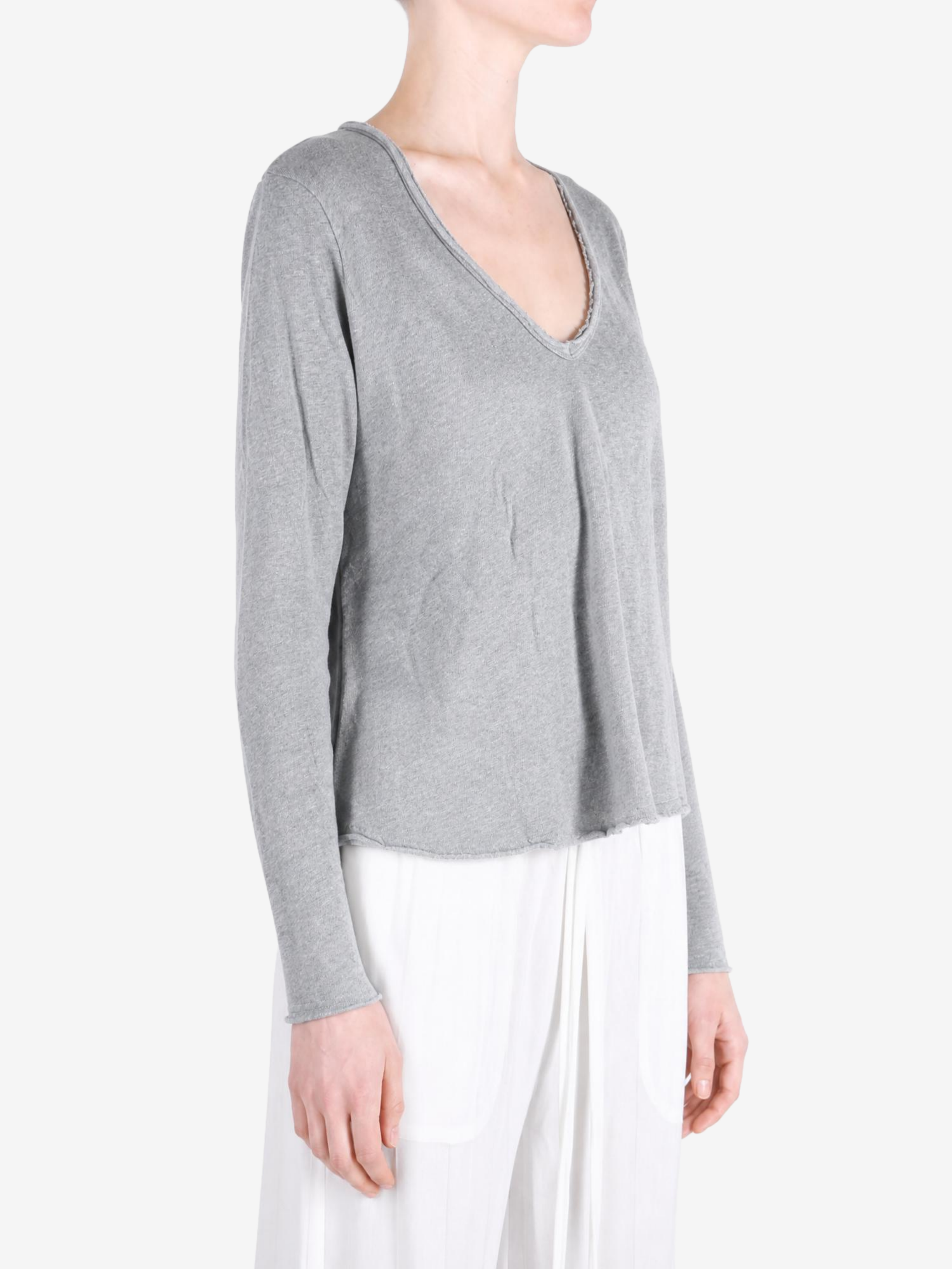 Grey t-shirt worn by a person, showing the t-shirt fit