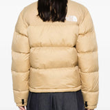 Tan jackets worn by a person, showing the  jackets fit