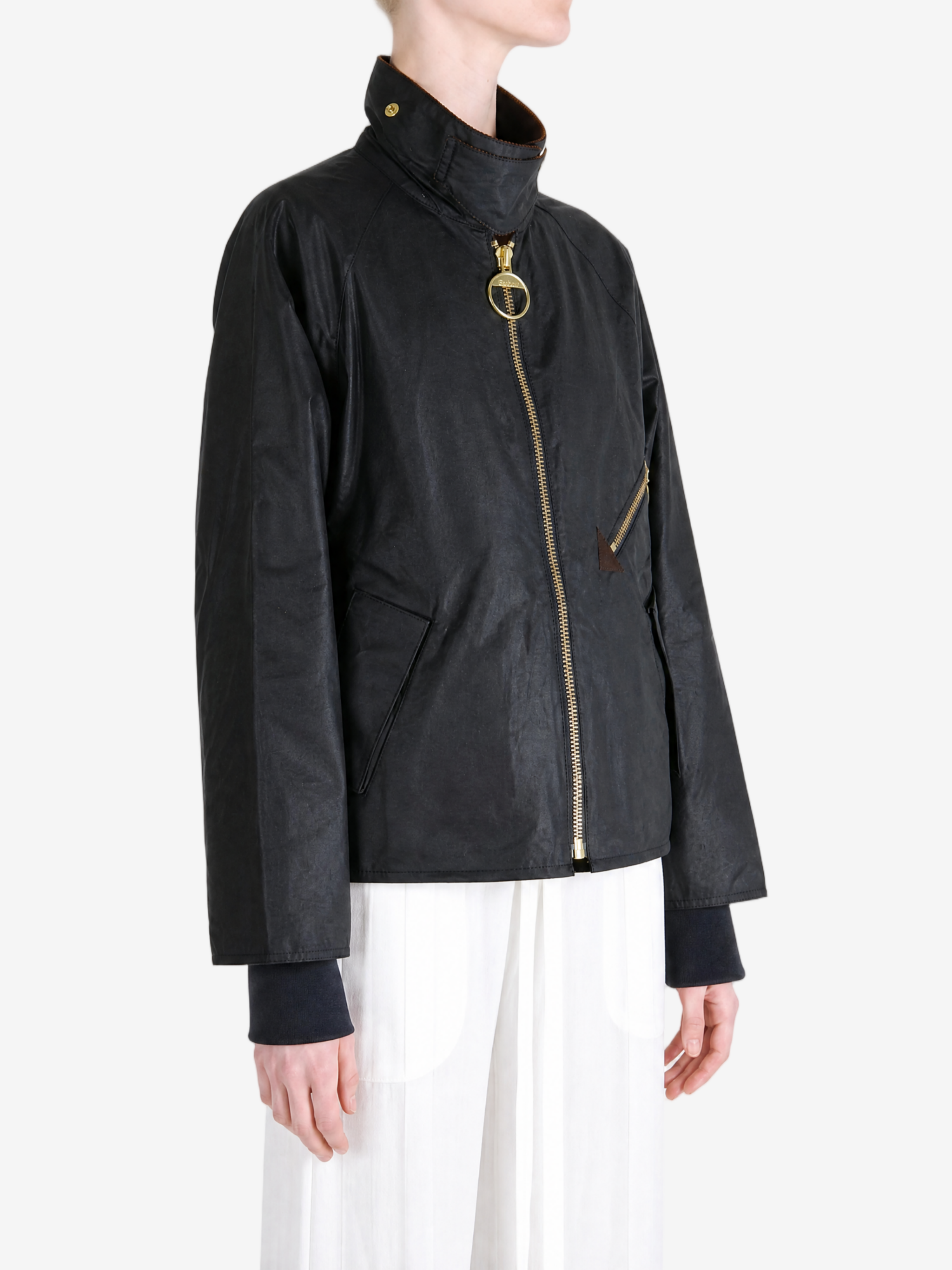 Black jacket worn by a person, showing the jacket fit