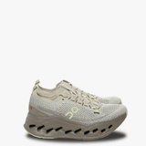 Tan sneakers, front view