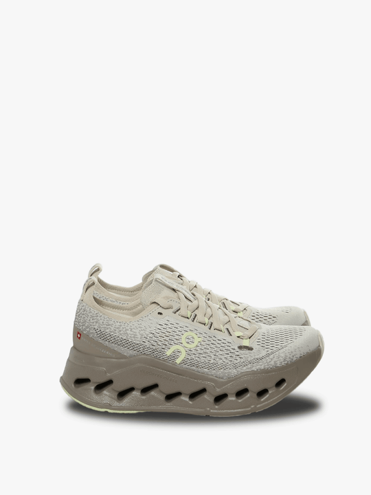 Tan sneakers, front view