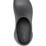 Close up of black shoes, showing texture of the thermoplastic fabric