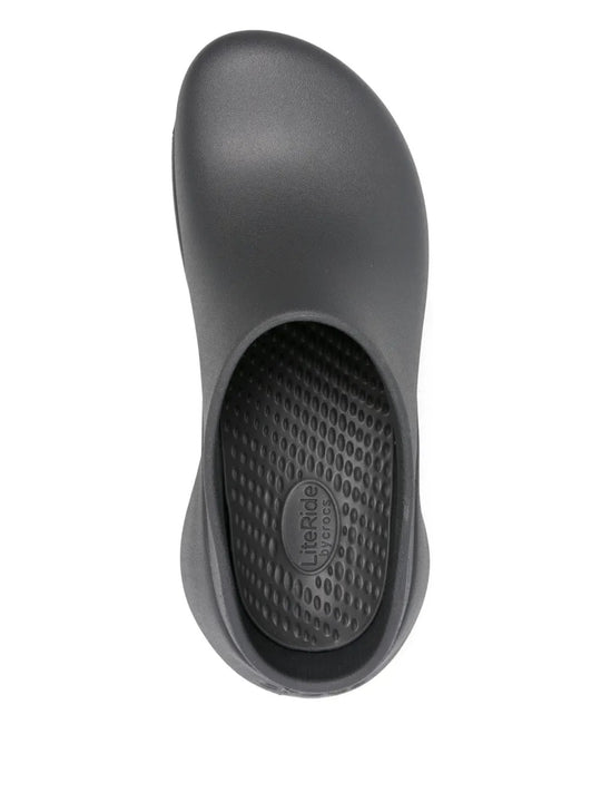 Close up of black shoes, showing texture of the thermoplastic fabric