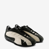 Black sneakers, side view