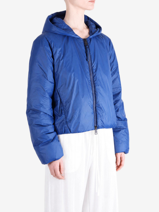 Blue jacket worn by a person, showing the jacket fit
