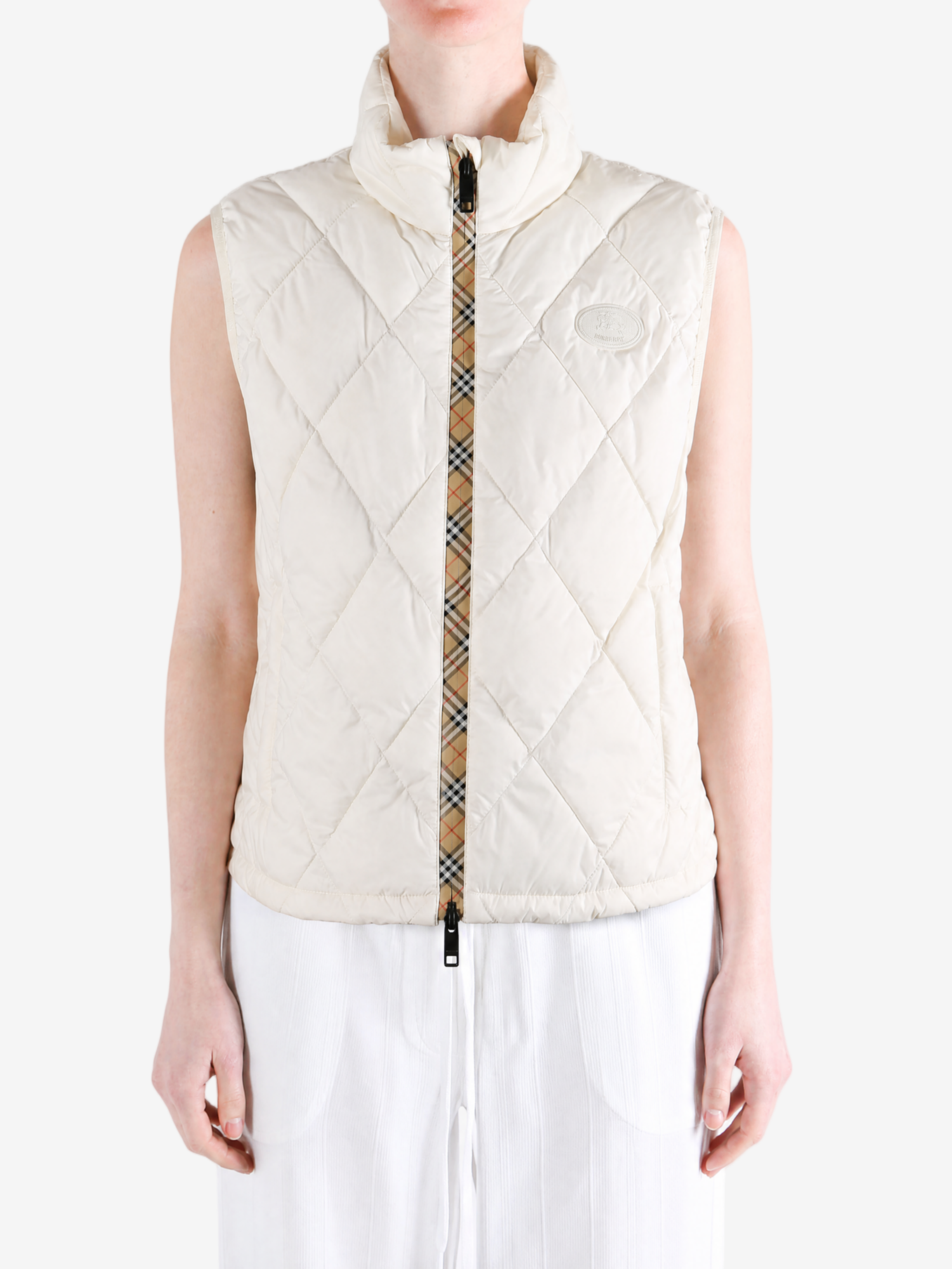 Tan jacket worn by a person, showing the jacket fit