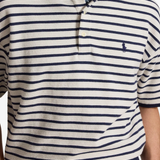Navy shirt worn by a person, showing the shirt fit