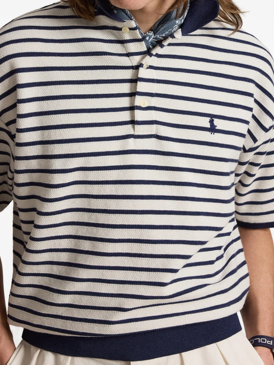 Navy shirt worn by a person, showing the shirt fit