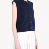 Navy top worn by a person, showing the top fit