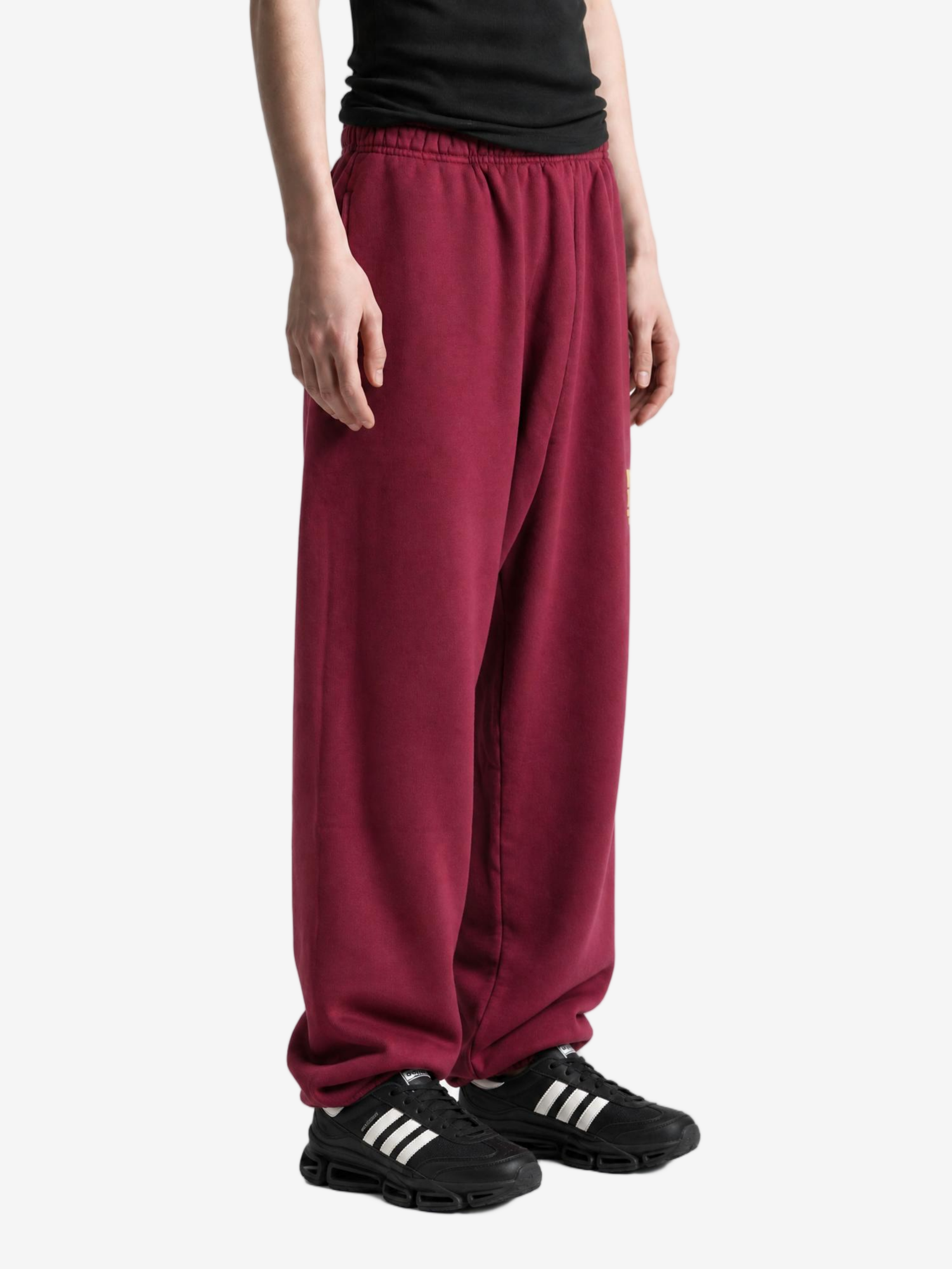 Burgundy pants, full body view