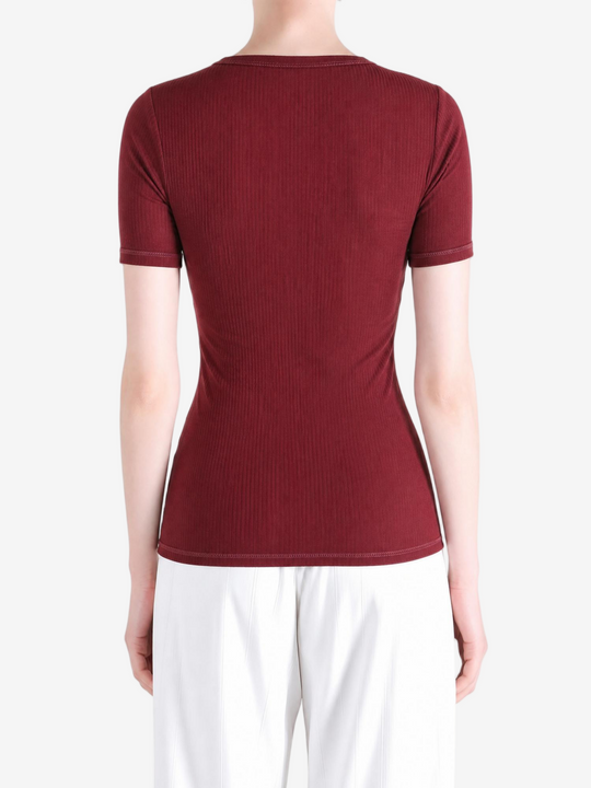 Burgundy t-shirt worn by a person, showing the t-shirt fit