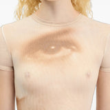 Tan t-shirt worn by a person, showing the t-shirt fit