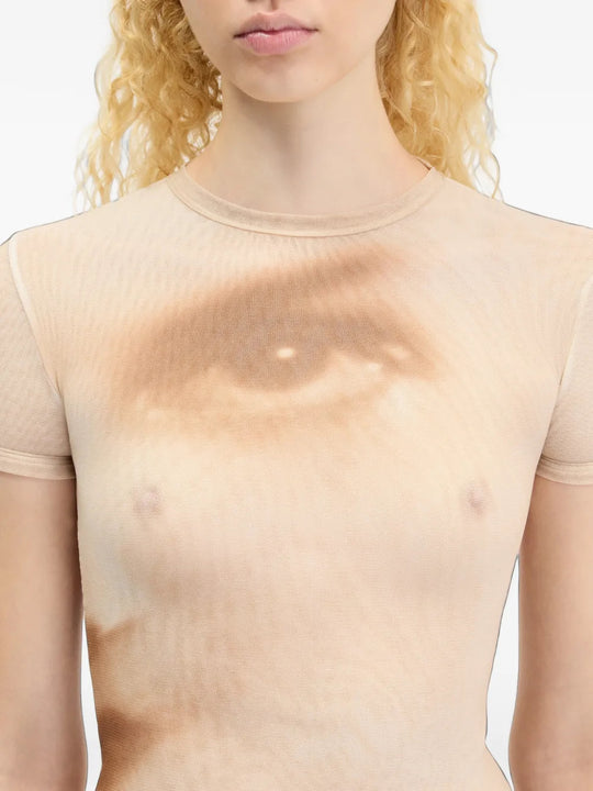 Tan t-shirt worn by a person, showing the t-shirt fit